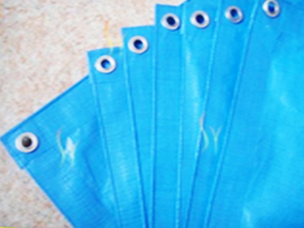 Industrial tarpaulin covers for outdoor protection